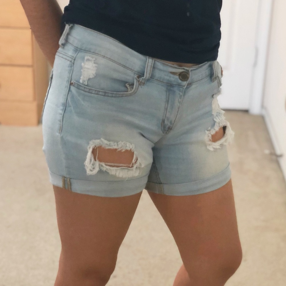 Light washed denim distressed shorts